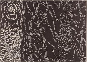 Dark cliff and beach