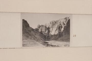 Down from Mile 202.4 left bank in Cataract Canyon showing the lower end of Rapid 22 with 23 in the distance. 8 AM