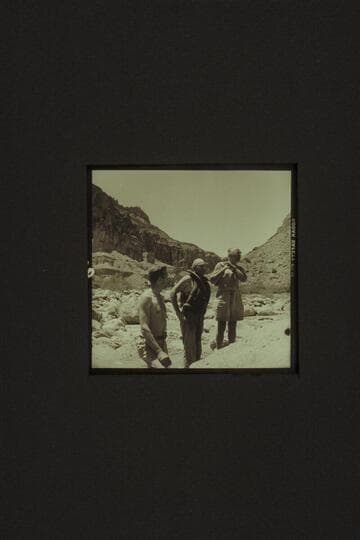 Looking over the Kwagunt Rapid. Left to right: Cutler; Sanderson; Masland. Kwagunt Canyon in the distance