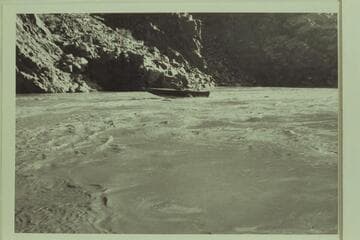 #1: The "Up Colorado" running upstream a mile or two above Bridge Canyon (?) Crew: Al Ross, Engr, USBR; Les Pampel, Engr, USBR; Harry Aleson, pilot. Photo #2 is a short distance upstream from this photo