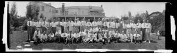 Group portrait of men at a clubhouse