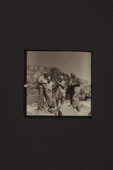 Some of the crew discussing the rapid at Mile 24.5. Left to right: Sanderson, Desloge, Masland, Marston and Taylor