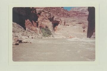 Cruising up the Vaseys Paradise on the jet run of 1960. Stanton Cave at right. Lees Ferry gauge: 11,100 cfs