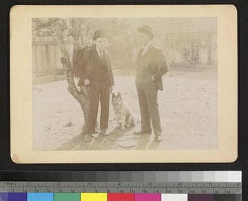 2 boys and a dog