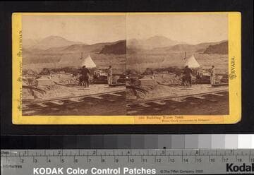 335. Building Water Tank. Trout Creek mountains in distance