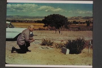 Dock Marston at grave of Frank V. Goodman. Galloway grave in background