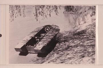 18 foot unit in the water at Lees Ferry; Disney Reconnaissance. Rigged for outboard powering, the boat is of metal and built by Seth Smith of Pheonix to the design of Jimmy Jordan