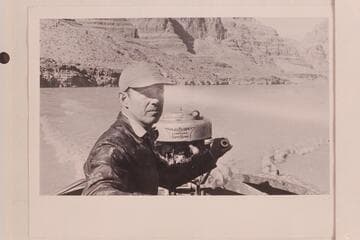 Bering Monroe in his motorboat in Glen Canyon. Bering cruised in Glen Canyon between 1944 and 1949